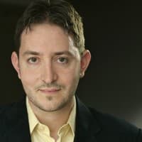 Portrait photo of Mike Tamir, PhD, Distinguished Scientist/Engineer, Machine Learning @ Shopify